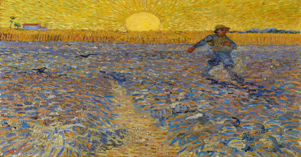 Man sowing seeds in a field